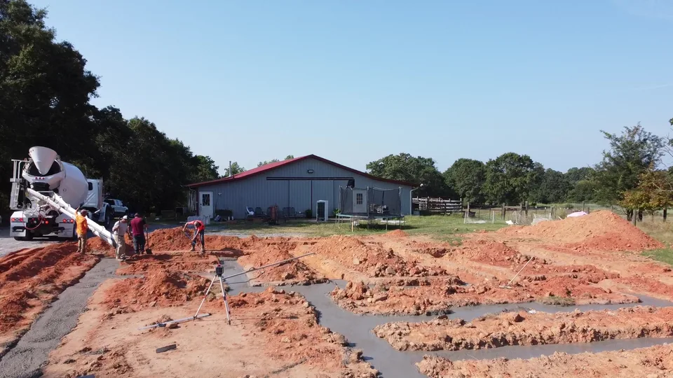 Wide view of a concrete footing pour