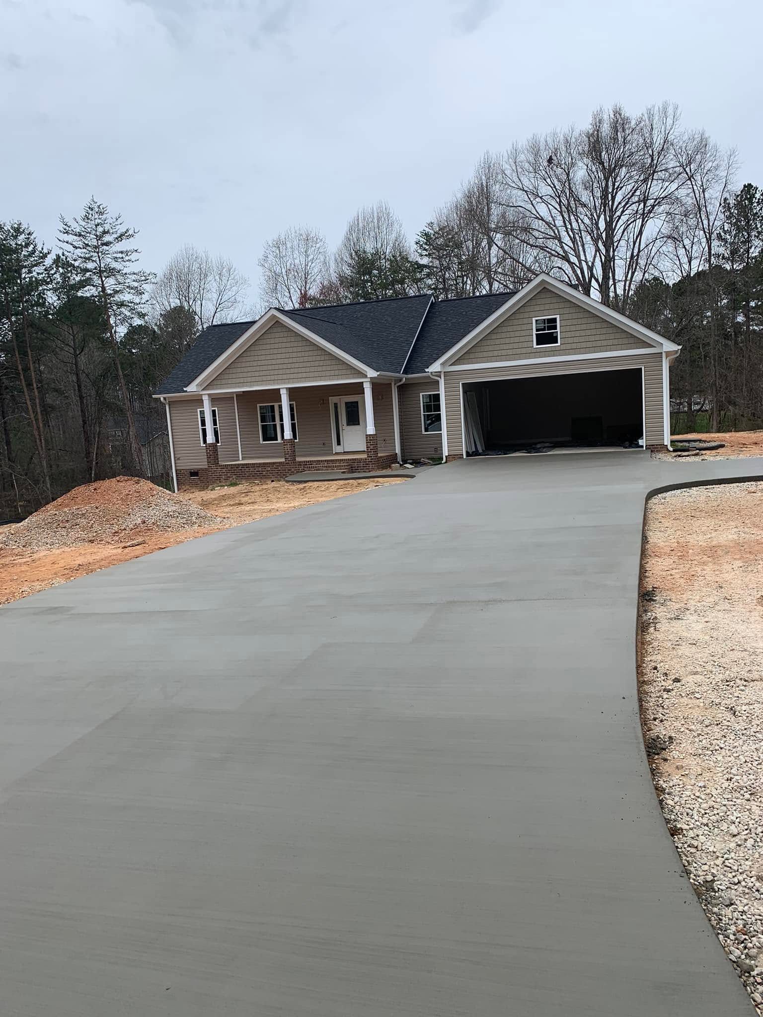 New concrete driveway to a residential garage